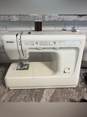 Kenmore  Sewing Machine Model 385.12618890 W/ Pedal, Manual, Extras, Works Great